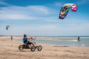 discover the various types of traction kites and learn about their specific uses, from kite surfing to landboarding and snowkiting.